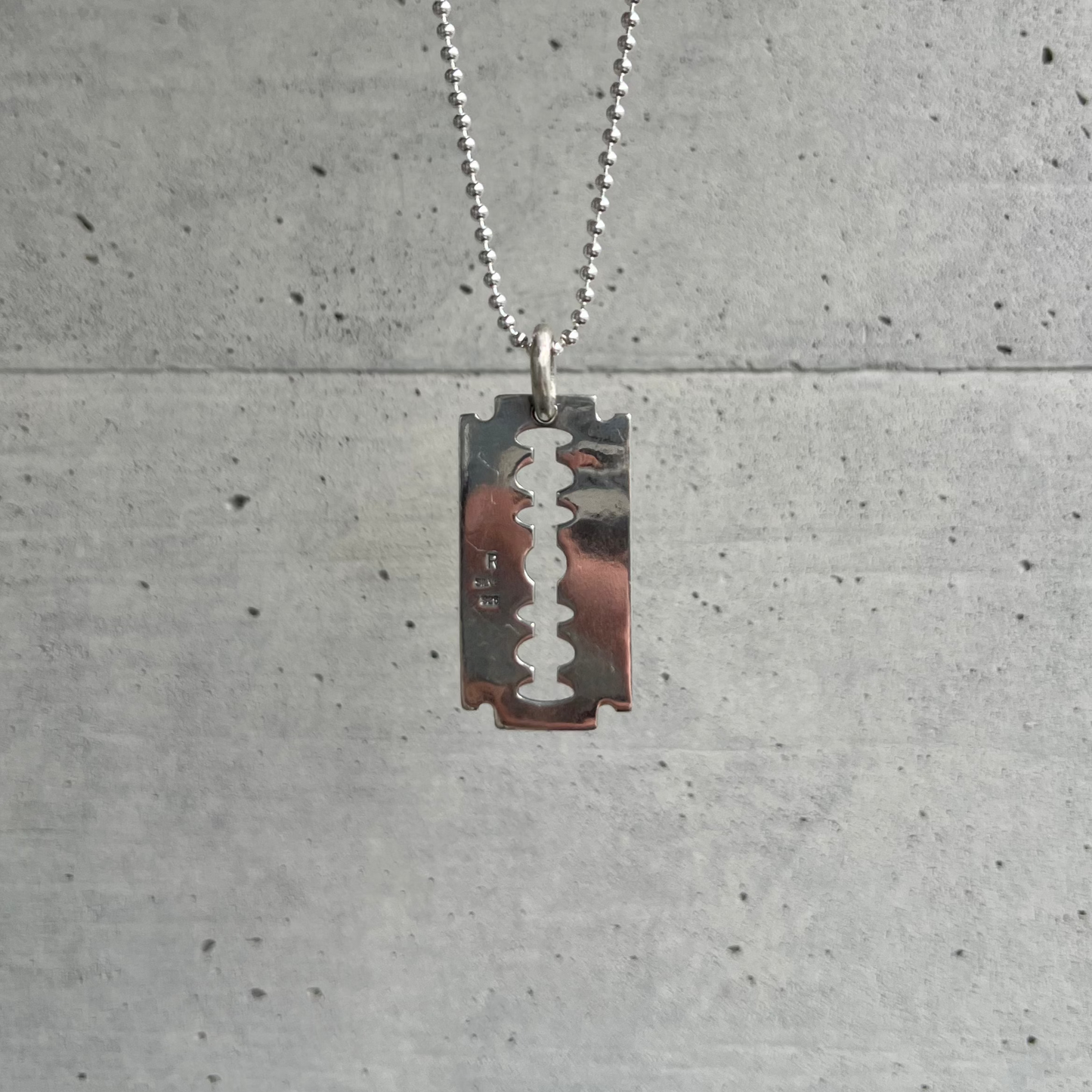 Razor Pendant