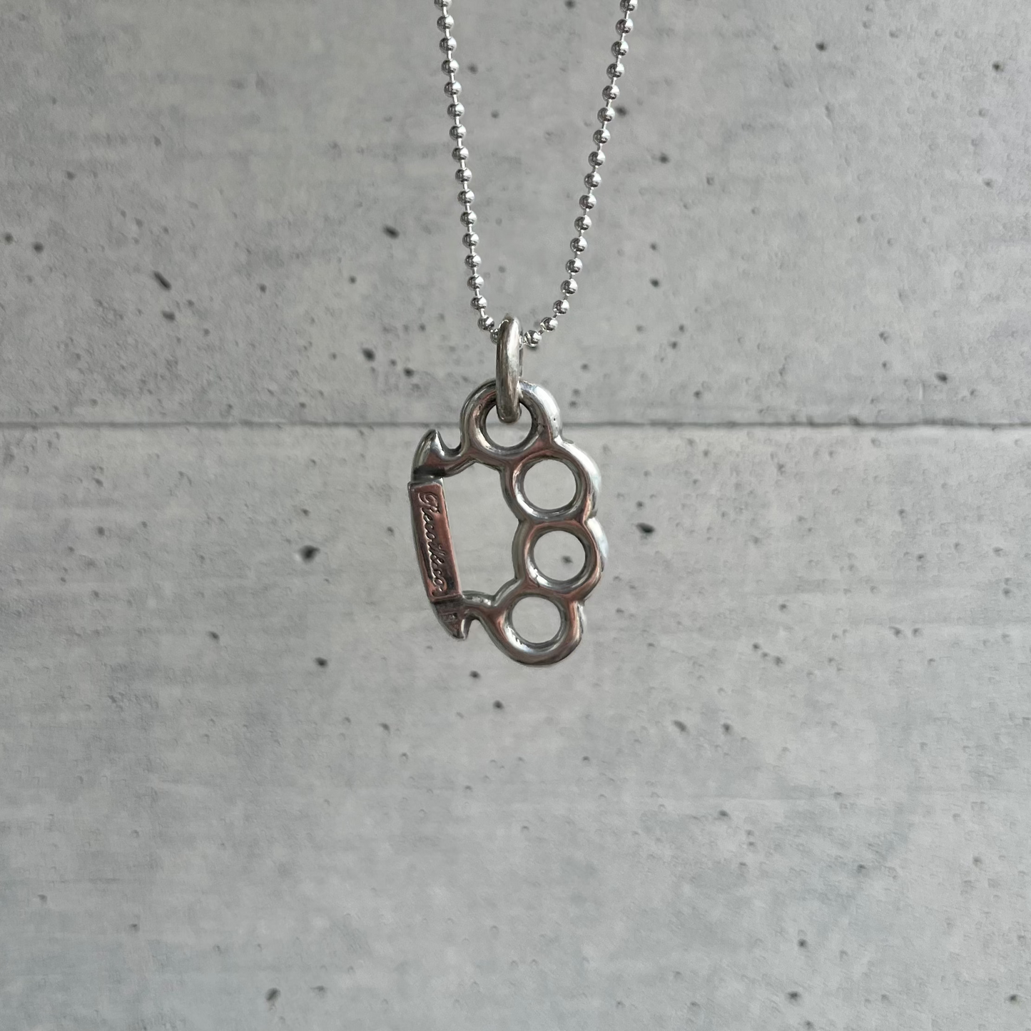 Brass Knuckles Pendant